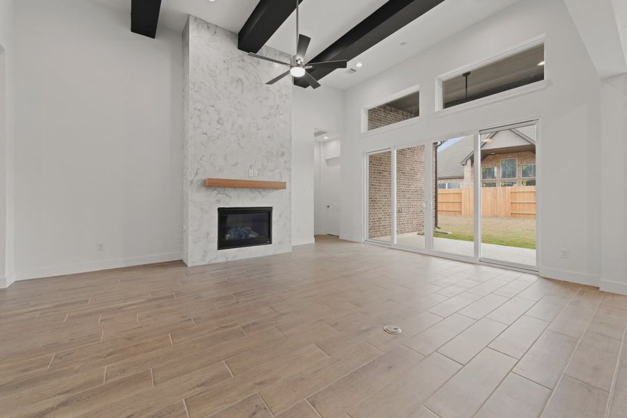 Representative unfurnished interior of a home built from the Rollins by Chesmar Homes in Gregg Ranch, Marble Falls (Image 7).