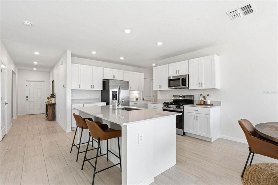 Furnished interior view inside a new home in Prosperity Lakes, Parrish (Image 9).