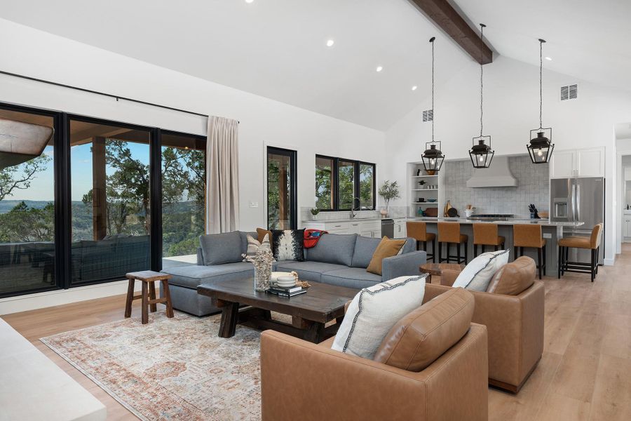 This is a TO BE BUILT custom home on 6.75 acres in Rainbow Ranch, Wimberley TX.