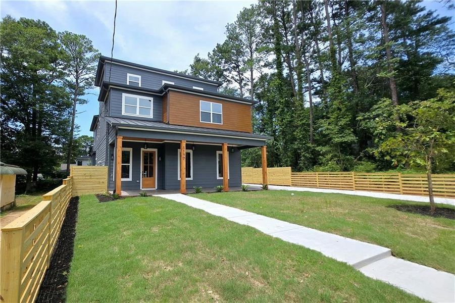 Front exterior of a new home in , Atlanta, GA, highlighting curb appeal (Image 25). Front exterior of a new home in , Atlanta, GA, highlighting curb appeal (Image 25).