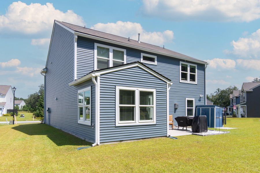 Front exterior of a new home in , Johns Island, SC, highlighting curb appeal (Image 18).
