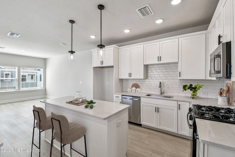 Furnished interior view inside a new home in Kettering at eTown - Garden Collection, Jacksonville (Image 5). Furnished interior view inside a new home in Kettering at eTown - Garden Collection, Jacksonville (Image 5).