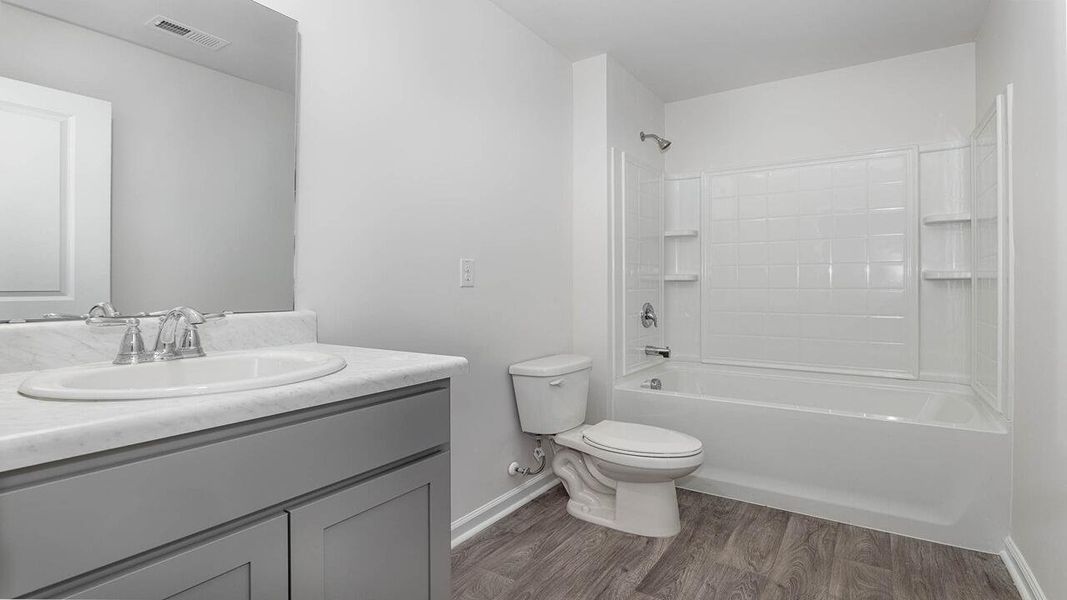 Furnished interior view inside a new home in The Ranch, Holly Hill (Image 7).