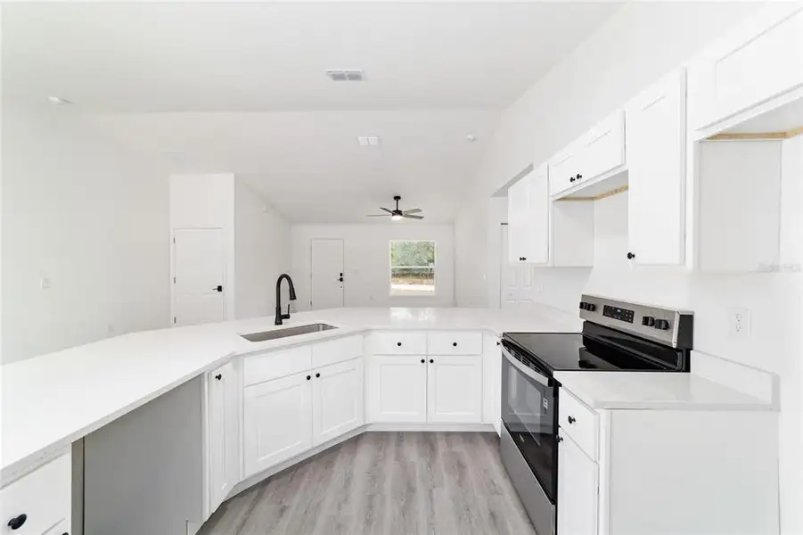 Furnished interior view inside a new home in , Dunnellon (Image 6).