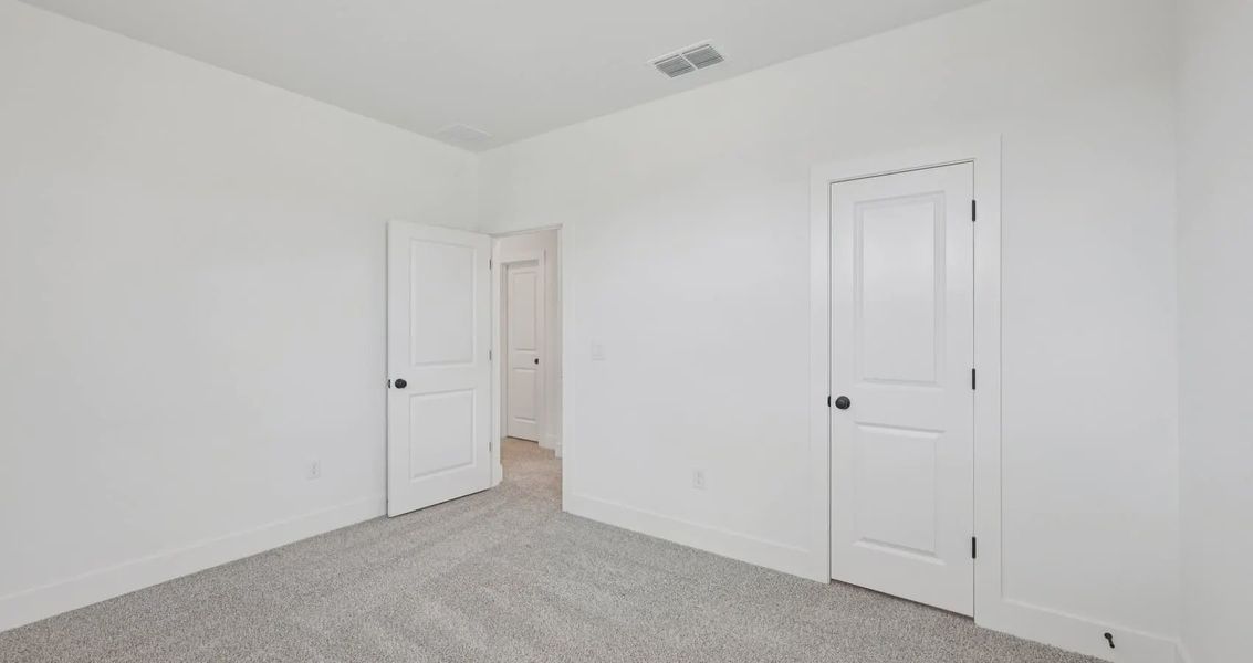 Spacious, unfurnished interior of a new home in Sunfield, Buda (Image 19). Spacious, unfurnished interior of a new home in Sunfield, Buda (Image 19).