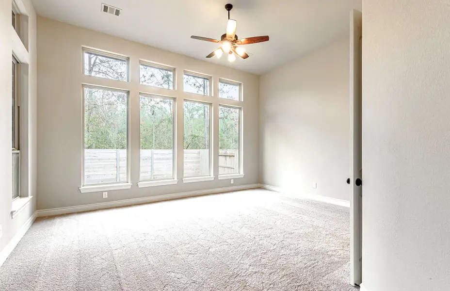 Representative unfurnished interior of a home built from the 3616 by Ravenna Homes in Artavia 70′, Conroe (Image 39).