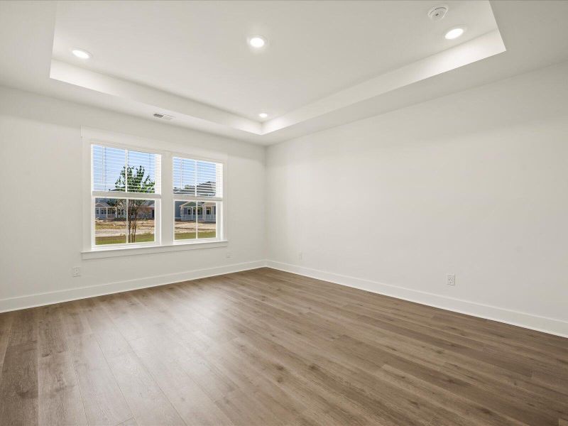 Spacious, unfurnished interior of a new home in The Coves at Lakes of Cane Bay, Summerville (Image 23). Spacious, unfurnished interior of a new home in The Coves at Lakes of Cane Bay, Summerville (Image 23).