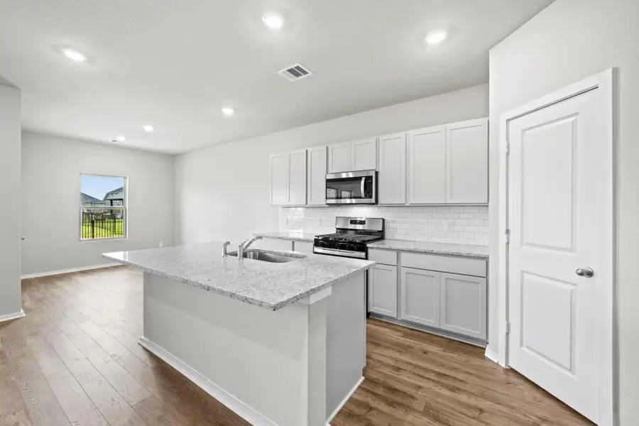 Furnished interior view inside a new home in Laurel Landing, Alvin (Image 7).
