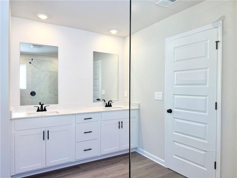 Furnished interior view inside a new home in Vines at Mill Creek - Estate Series, Braselton (Image 9). Furnished interior view inside a new home in Vines at Mill Creek - Estate Series, Braselton (Image 9).