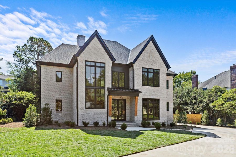 Front exterior of a new home in Stratford Chase, Charlotte, NC, highlighting curb appeal (Image 2). Front exterior of a new home in Stratford Chase, Charlotte, NC, highlighting curb appeal (Image 2).