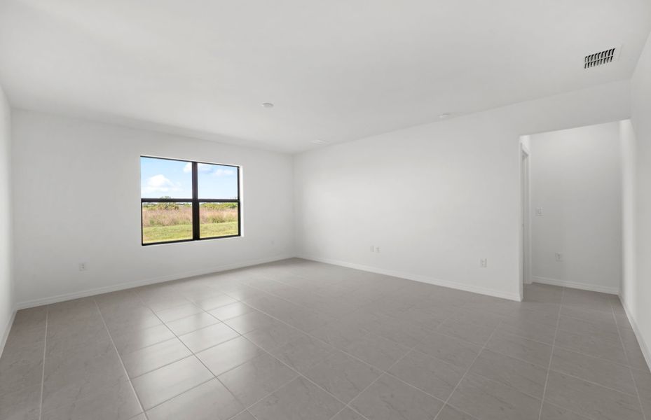 Spacious, unfurnished interior of a new home in Whispering Lakes, Lehigh Acres (Image 23).