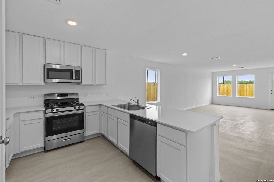 Furnished interior view inside a new home in Spring Grove, St. Hedwig (Image 4).