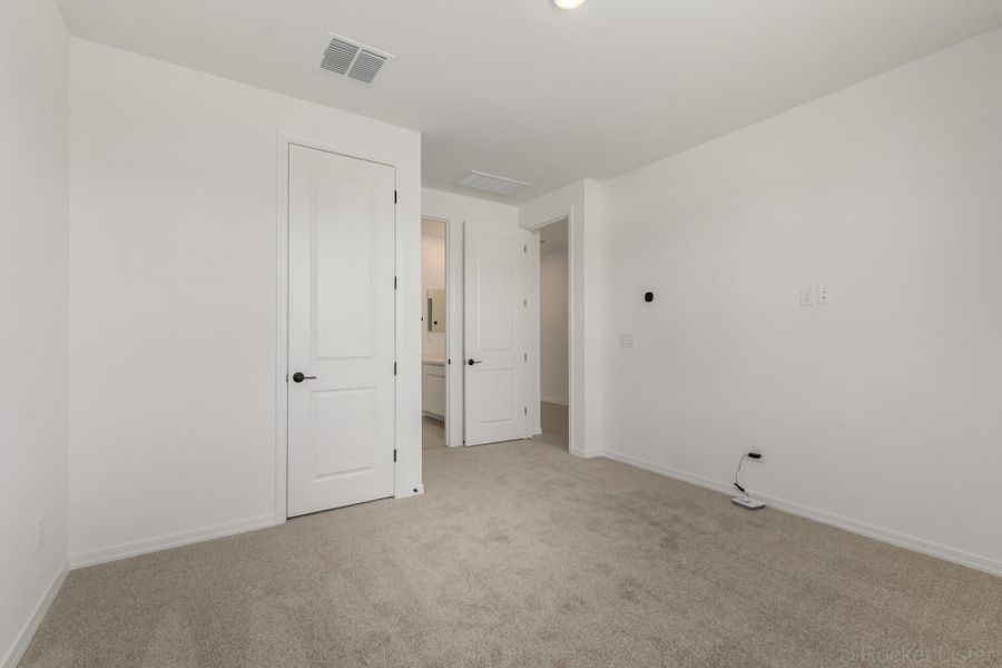 Spacious, unfurnished interior of a new home in Tyler Ranch, Buckeye (Image 13). Spacious, unfurnished interior of a new home in Tyler Ranch, Buckeye (Image 13).