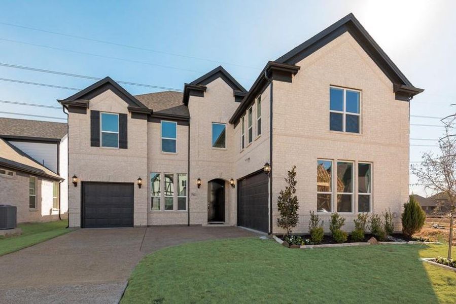 Front exterior of a new home in Cedar Ridge Estates, Grand Prairie, TX, highlighting curb appeal (Image 1). Front exterior of a new home in Cedar Ridge Estates, Grand Prairie, TX, highlighting curb appeal (Image 1).