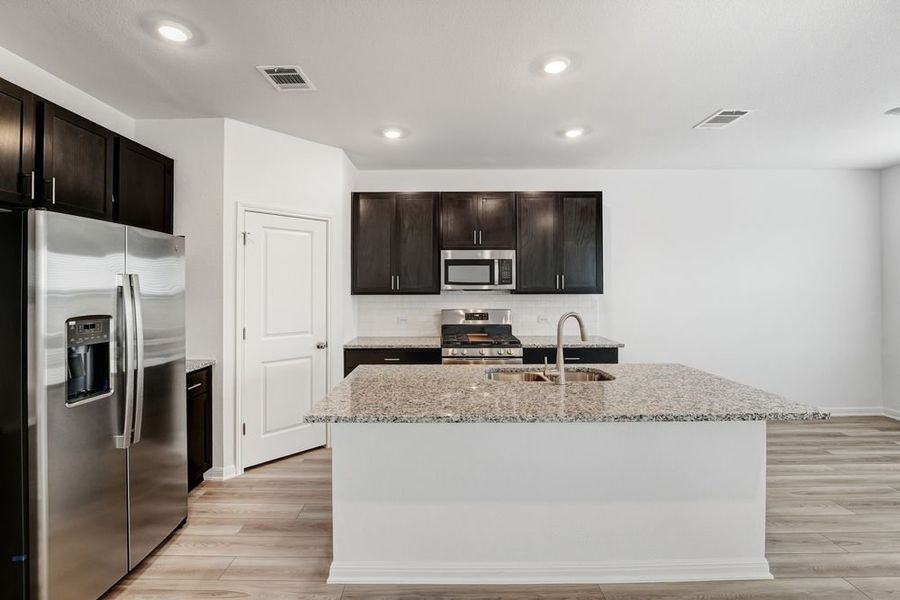 Furnished interior view inside a new home in Longview, Del Valle (Image 4).