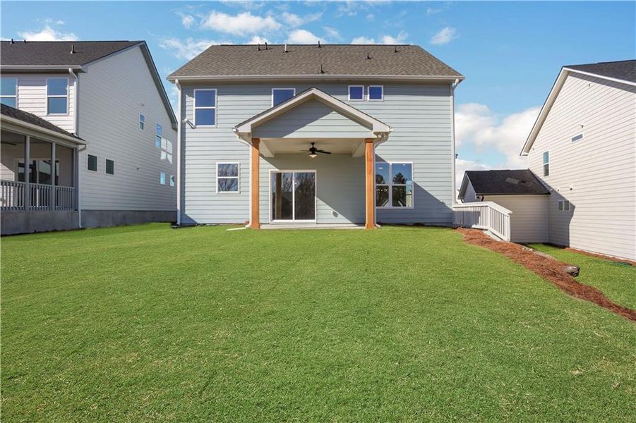 Exterior details and patio area of a home in Twin Lakes, Hoschton (Image 26).