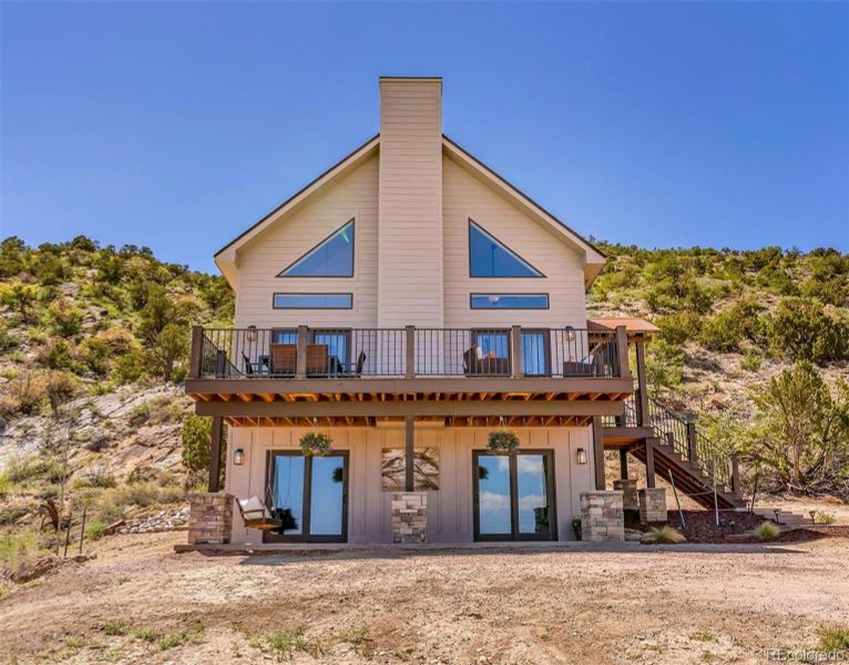 Front exterior of a new home in , Cañon City, CO, highlighting curb appeal (Image 21).