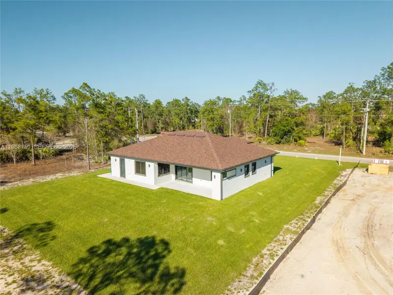 Exterior details and patio area of a home in , Lehigh Acres (Image 3). Exterior details and patio area of a home in , Lehigh Acres (Image 3).