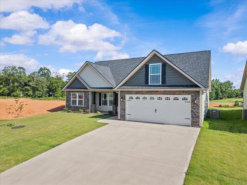 Front exterior of a new home in Mills Gin, Campobello, SC, highlighting curb appeal (Image 2).