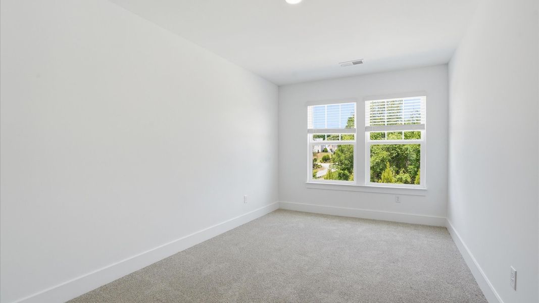 First-class bedroom with generous proportions, a walk-in closet, and beautiful natural light through large windows in SC