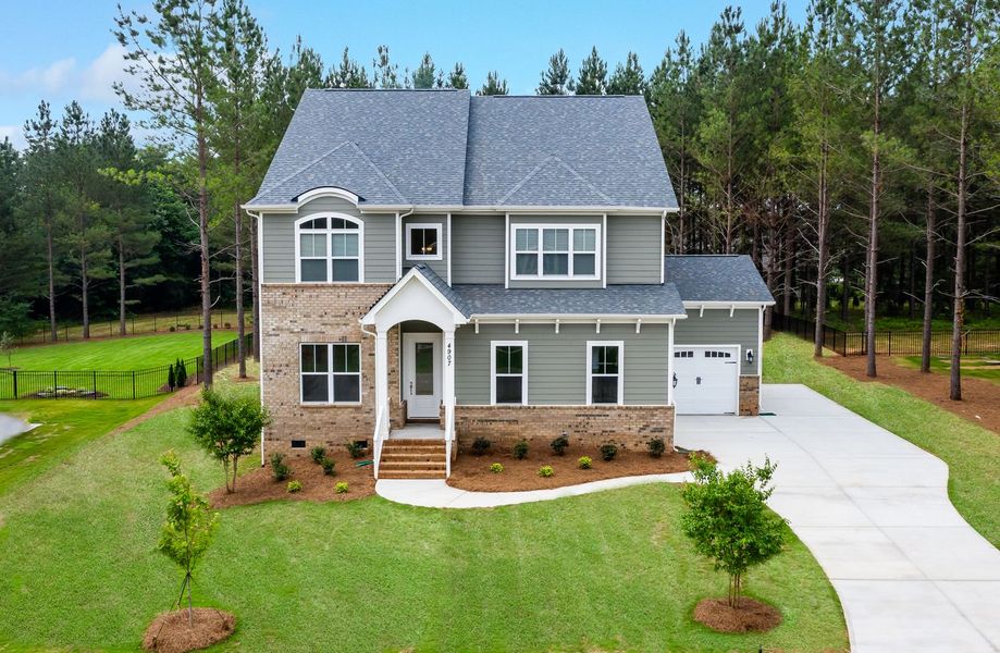 Representative exterior photo of a completed home built from the St Andrews with 3rd Floor Retreat by Greybrook Homes in Edmunds Farm, Clover, SC (Image 28).
