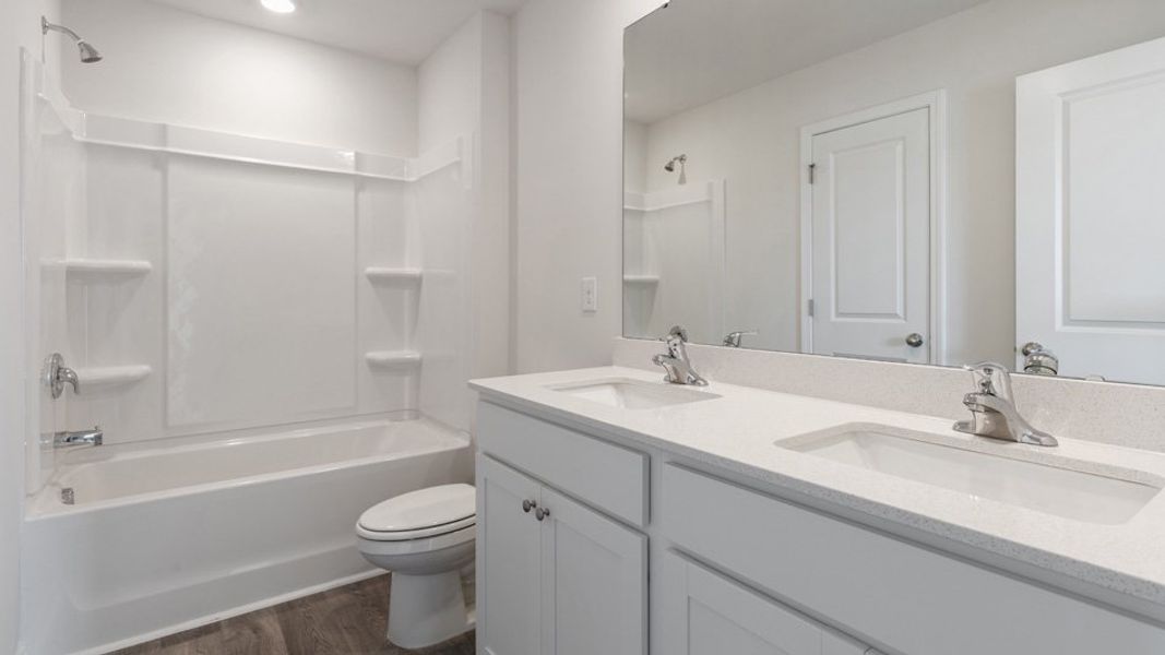 Furnished interior view inside a new home in The Townes at Matthews Landing, Fuquay Varina (Image 7). Furnished interior view inside a new home in The Townes at Matthews Landing, Fuquay Varina (Image 7).