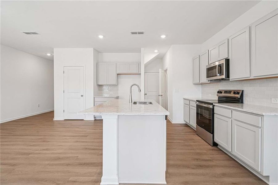 Furnished interior view inside a new home in Eastlyn Crossing, Flowery Branch (Image 8). Furnished interior view inside a new home in Eastlyn Crossing, Flowery Branch (Image 8).