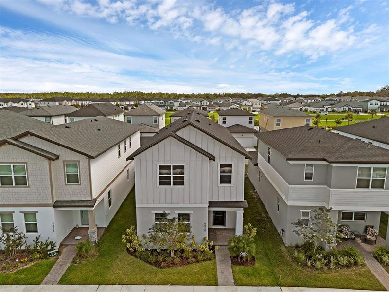 Front exterior of a new home in , St. Cloud, FL, highlighting curb appeal (Image 28).
