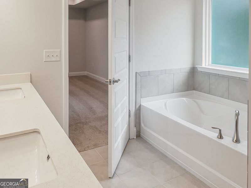 Furnished interior view inside a new home in Windmill Park, Carrollton (Image 6).
