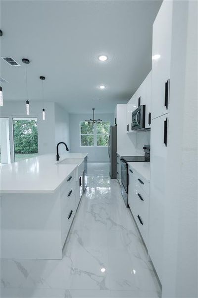 Furnished interior view inside a new home in , Deltona (Image 10).