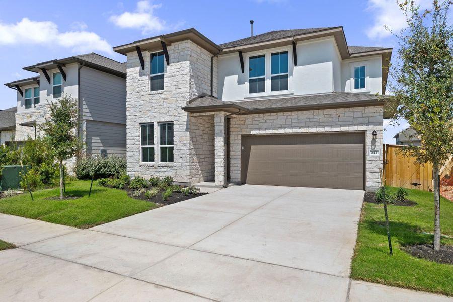 Front exterior of a new home in Park Central, Georgetown, TX, highlighting curb appeal (Image 25).