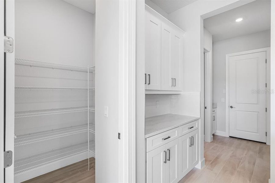 Furnished interior view inside a new home in Esplanade at Westview, Kissimmee (Image 4).