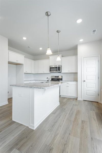 Furnished interior view inside a new home in Laurel Ridge, Rock Spring (Image 5).