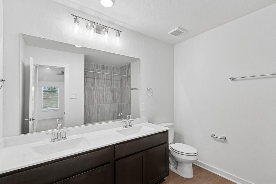 Furnished interior view inside a new home in Pinewood at Grand Texas, New Caney (Image 5).