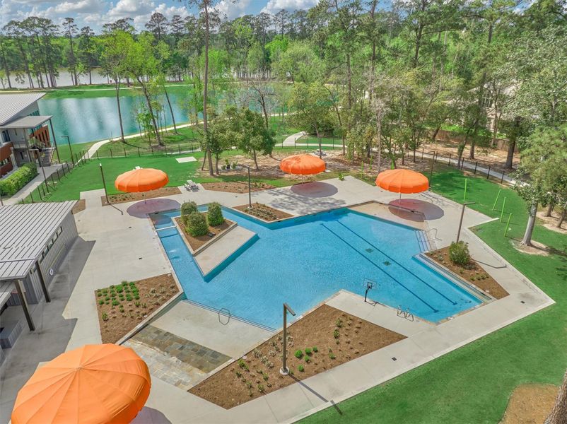 Resort-style pool at The Lake House amenity complex! The pool area includes hammocks and Adirondack chairs to hang, a basketball goal, picnic tables and beautiful lake views.