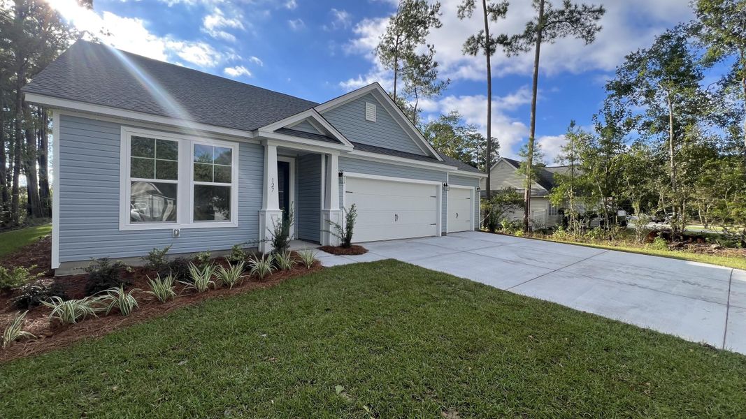 Exterior details and patio area of a home in Dorchester County Homes, Summerville (Image 3).