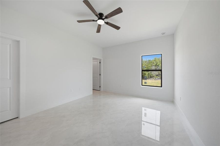 Spacious, unfurnished interior of a new home in , Port Charlotte (Image 32).