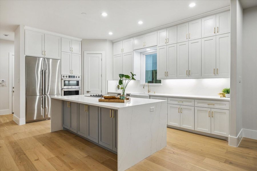 Kitchen - located on the first floor. Features commercial style Dacor appliance package. Kitchen - located on the first floor. Features commercial style Dacor appliance package.