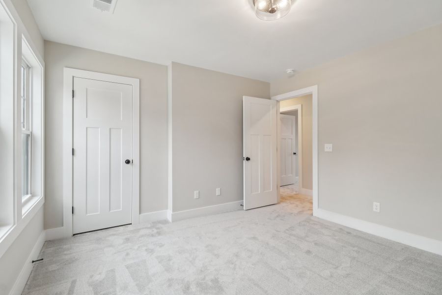 Representative unfurnished interior of a home built from the Ashbourne II by Great Southern Homes in Collins Cove, Chapin (Image 49).
