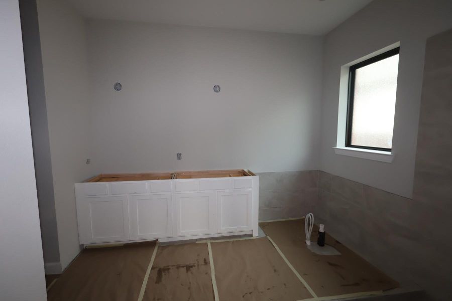 In-progress construction of a new home in Riceland 50’ Front Load Homesites, Mont Belvieu, TX (Image 11).