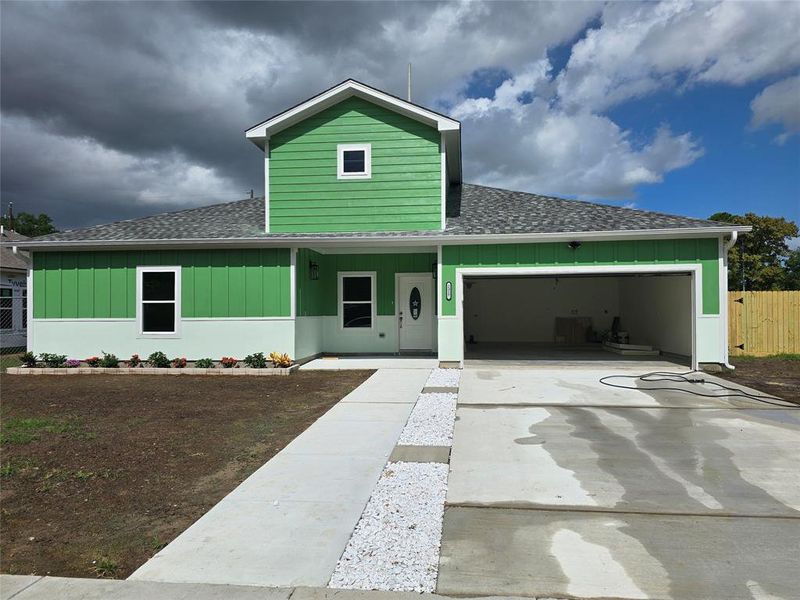 Front exterior of a new home in , Pearland, TX, highlighting curb appeal (Image 2).