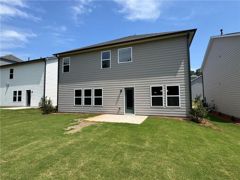 Exterior details and patio area of a home in Creekside, Dawsonville (Image 4).