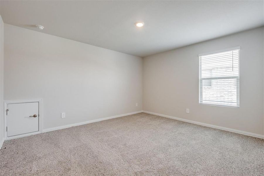 Unfurnished room featuring carpet