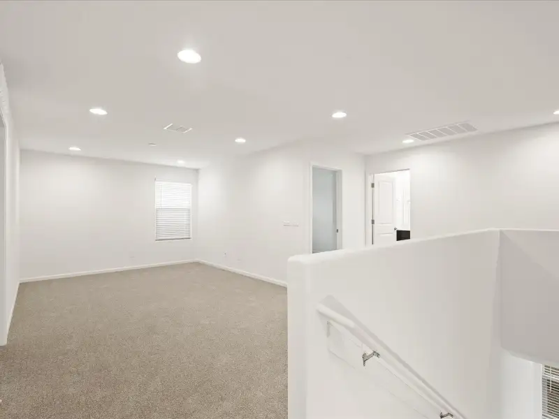 Spacious, unfurnished interior of a new home in Mandarina - Signature Series, Marana (Image 10).