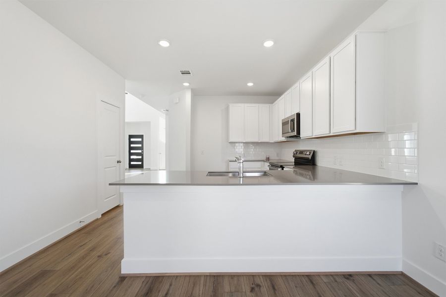 Representative furnished interior of a home built from the Alder by CastleRock Communities in Notting Hill, Converse (Image 8).
