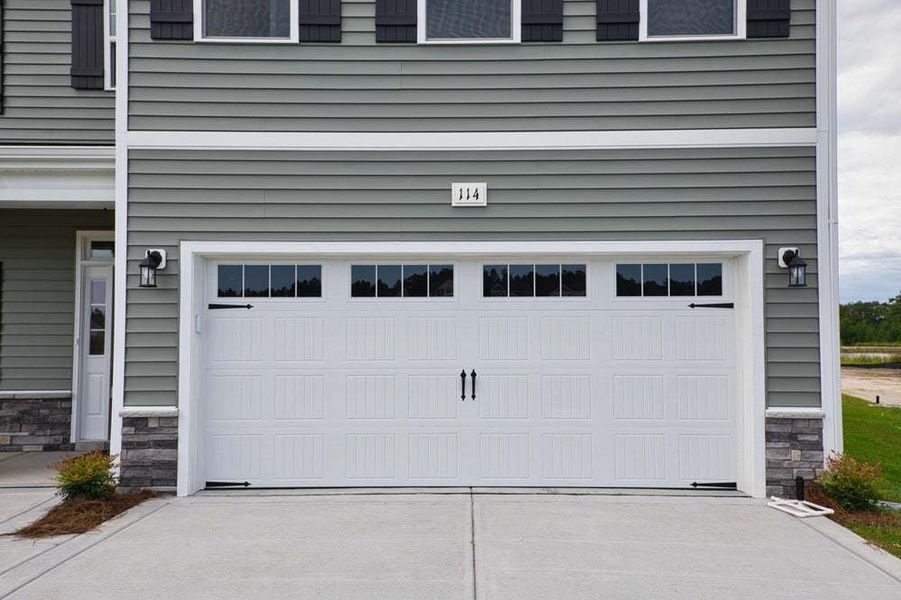 Representative exterior photo of a completed home built from the Pamlico by Caviness & Cates Communities in Bartlett Manor, Youngsville, NC (Image 15).