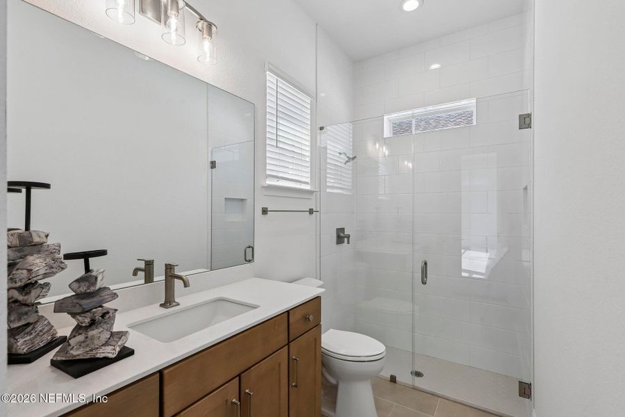 Furnished interior view inside a new home in SilverLeaf, St. Augustine (Image 60).