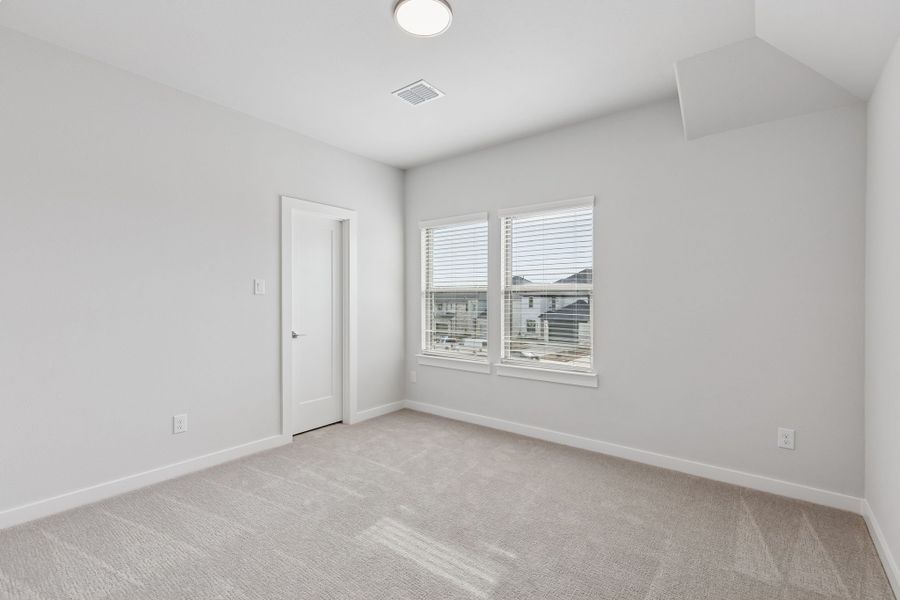 Bedroom in the Stanley II home plan by Trophy Signature Homes – REPRESENTATIVE PHOTO Bedroom in the Stanley II home plan by Trophy Signature Homes – REPRESENTATIVE PHOTO