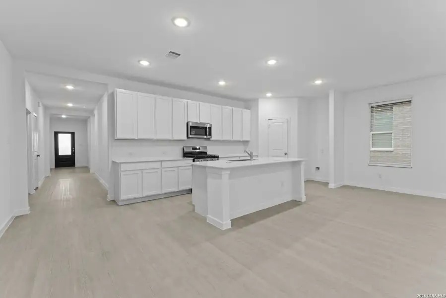 Furnished interior view inside a new home in Brookmill, San Antonio (Image 7).