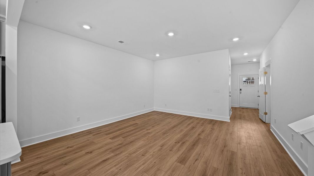 Vibrant and welcoming family room anchored by clean lines, tasteful materials, and abundant light located in Spartanburg, SC